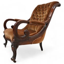 Victorian mahogany framed drawing room chair, scrolled back with bell-flower mouldings over scrolled arm terminals, upholstered in buttoned hazelnut brown fabric with sprung seat, cabriole supports on castors