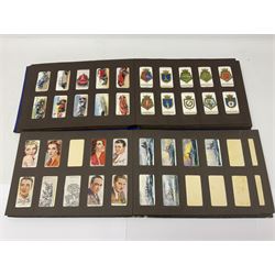 Four albums of cigarette cards, including Will's and Player's examples