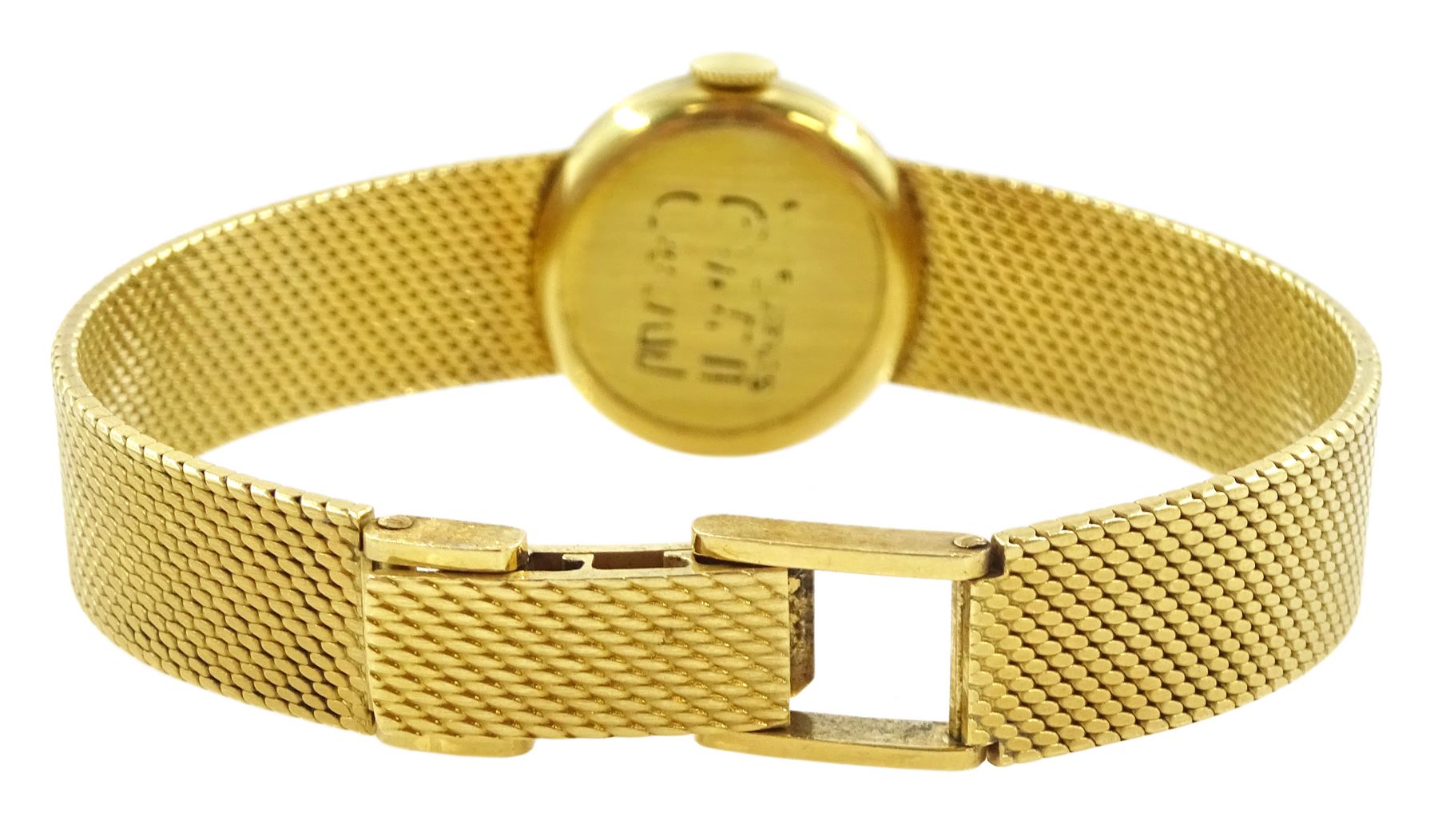 International Watch Company ladies 18ct gold manual wind wristwatch, silvered dial with baton hour markers, on integral 18ct gold bracelet, stamped 750, with guarantee dated 1968