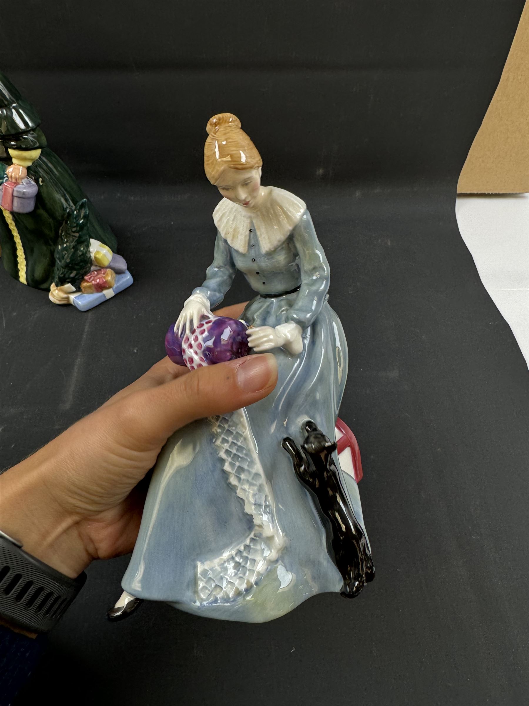 Four Royal Doulton figures, comprising The Parson's Daughter HN564, Dorothy HN3098, Christmas Parcels HN2851 and Biddy Pennyfarthing HN1843