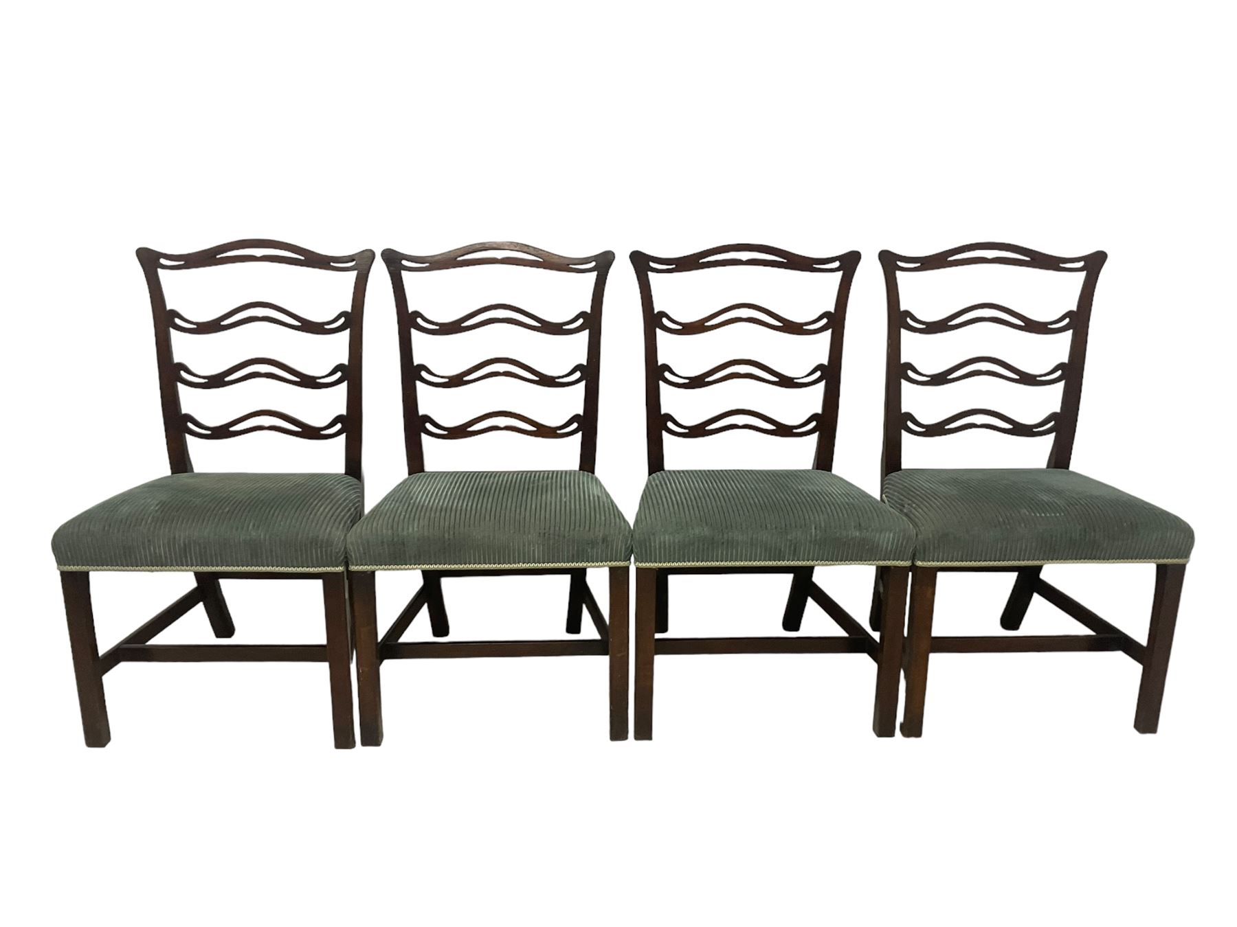 Set of twelve (10+2) Chippendale revival stained beech dining chairs, pierced waived ladder backs with over-stuffed over seats, on square moulded supports joined by stretchers