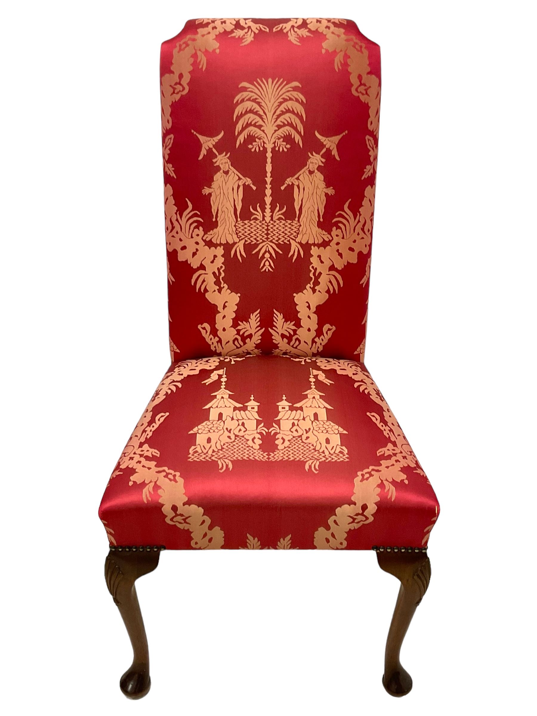 Georgian design mahogany framed high-back side chair, upholstered in red fabric decorated with Japanese figures in a garden landscape and pagodas, on shell carved cabriole front supports
Provenance: From the Estate of the late Dowager Lady St Oswald