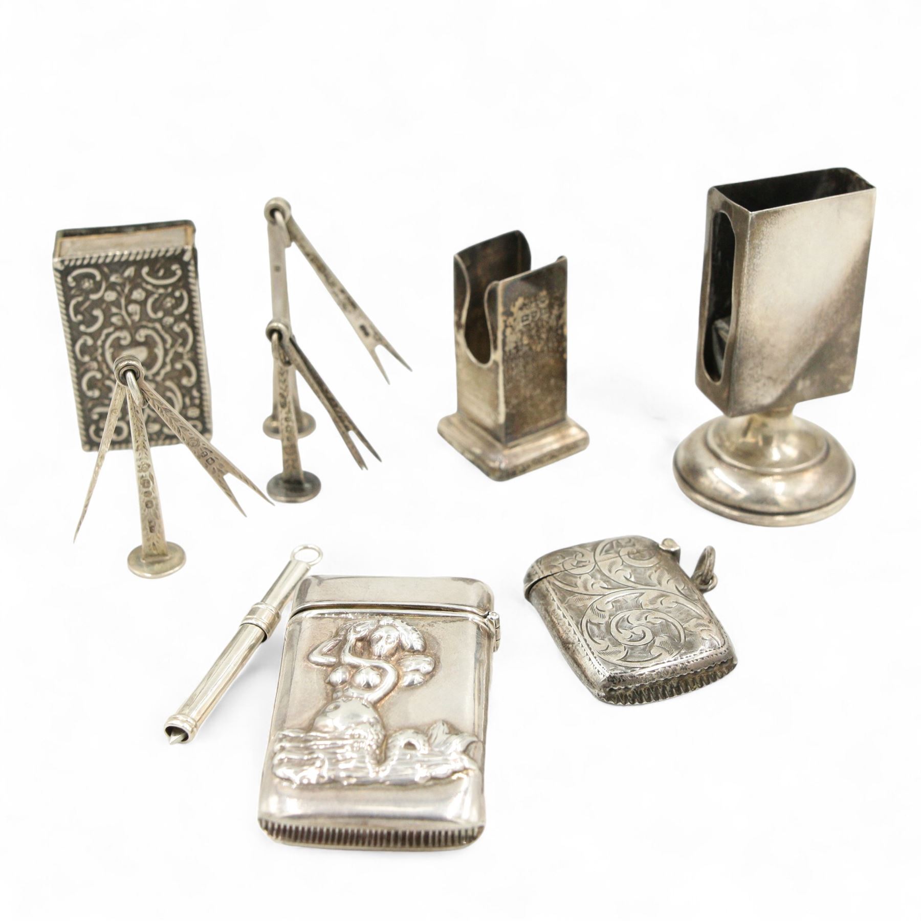 Silver vesta case with female figure decoration, engraved silver vesta case, two silver match box holders three silver pipe tampers, silver spike and silver sealing wax holder