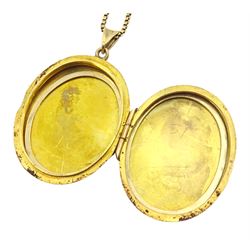 Gold locket pendant, with engraved rose decoration, on gold box link chain necklace, both 9ct