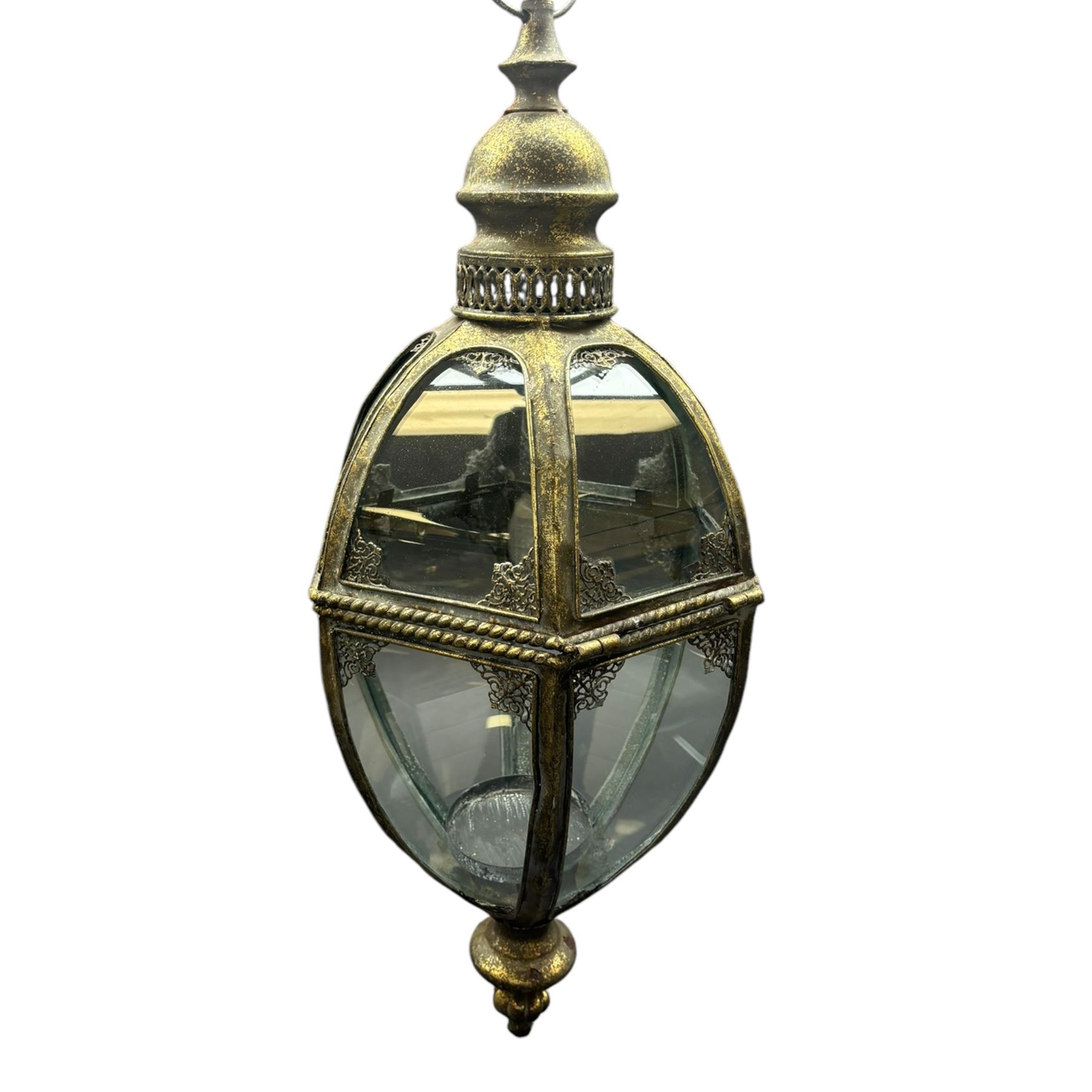 Modern bronze finish glazed lantern of hexagonal tapering form, raised upon bronze finish stand and four scroll supports, H163cm  