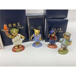 Eight Halcyon Days Teddy Bear of the Year figures, from 1993 to 2000, including one example modelled as a bear in Greek dress carrying a torch, one example modelled as a schoolboy and one example in a blue dress, all boxed 