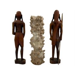 African carved wooden marriage/wedding chain, together with three carved figures, largest H44cm