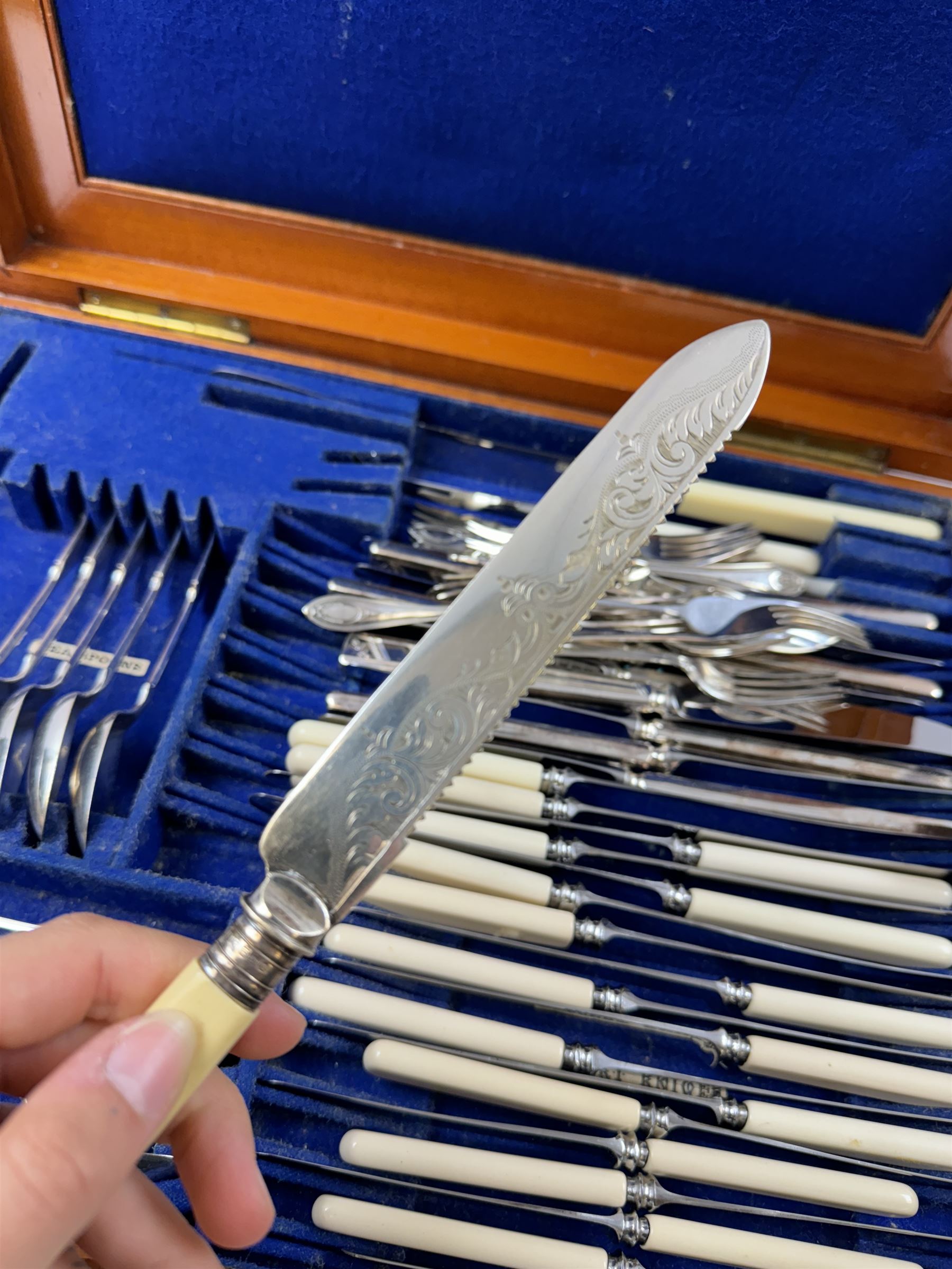 Early 20th century mahogany canteen box, containing selection of matched silver plated cutlery