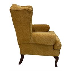 Wingback armchair, upholstered in golden wheat ground fabric with lattice pattern, on cabriole feet