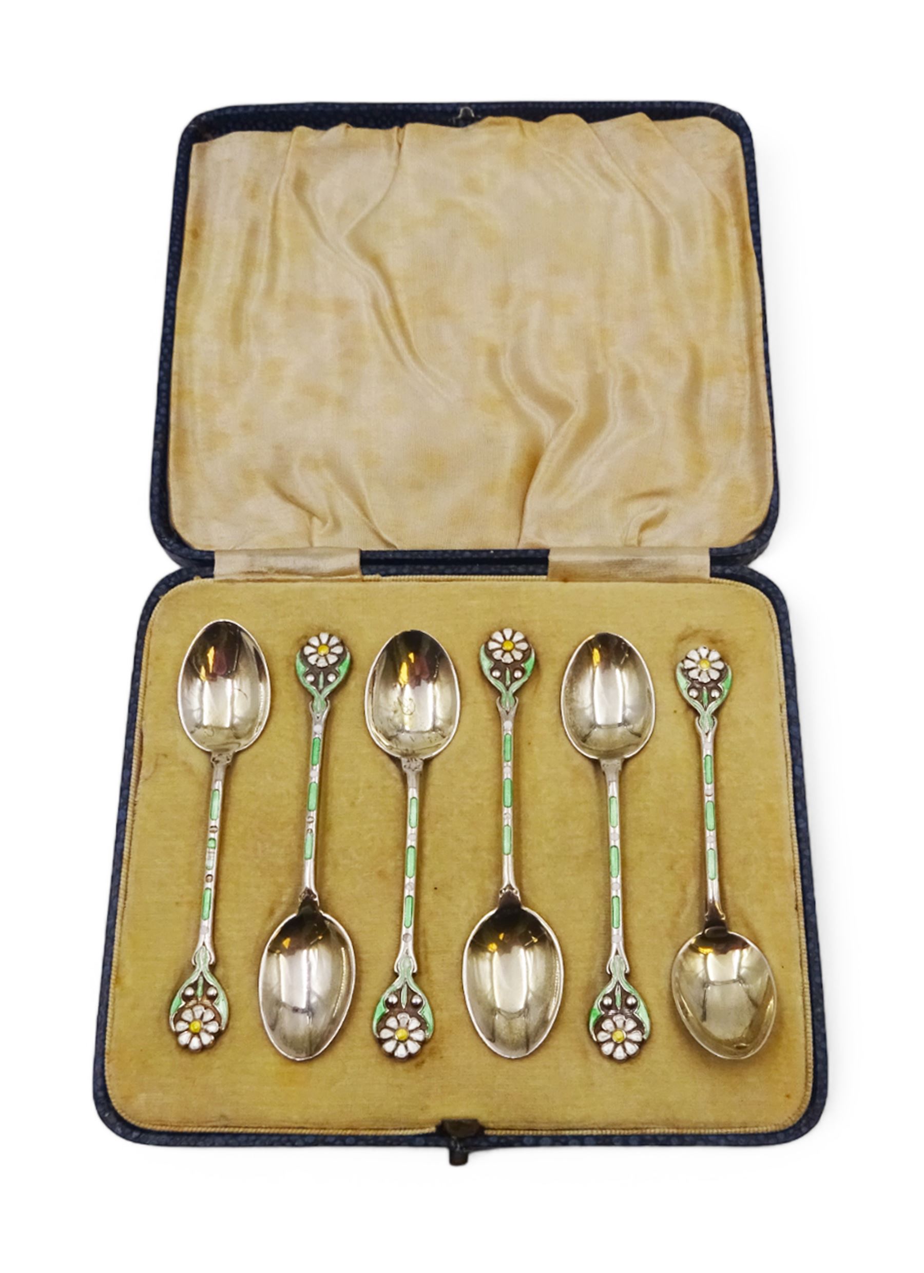 Set of six 1930s silver coffee spoons, each with enamelled daisy decoration to terminal with green and white enamelled stems, hallmarked Turner & Simpson Ltd, Birmingham 1936, contained within fitted case