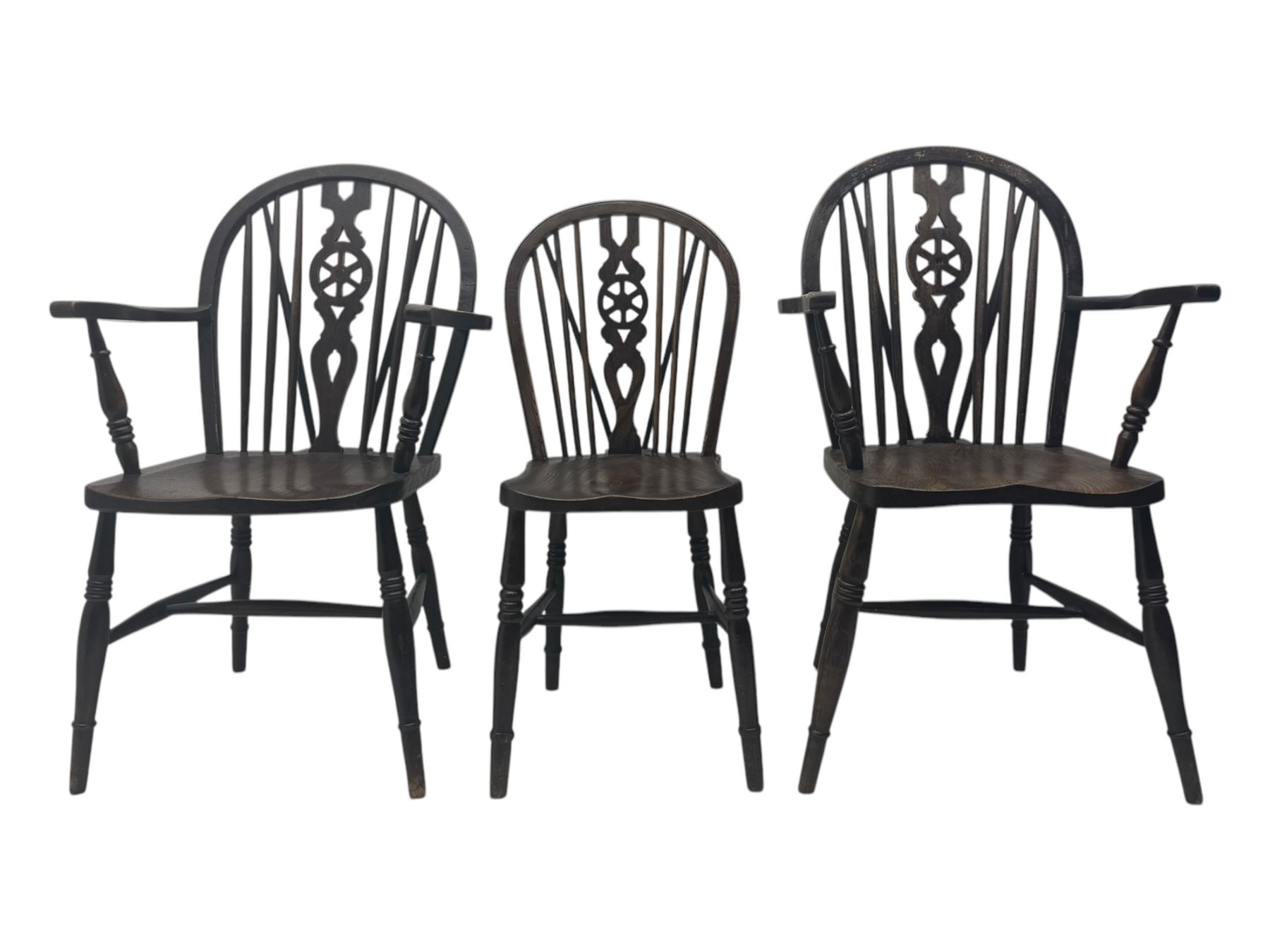 Set of six 19th century elm and ash dining chairs, hoop back with pierced wheel-shaped central splat, shaped saddle seat, raised on turned supports united by H-stretchers