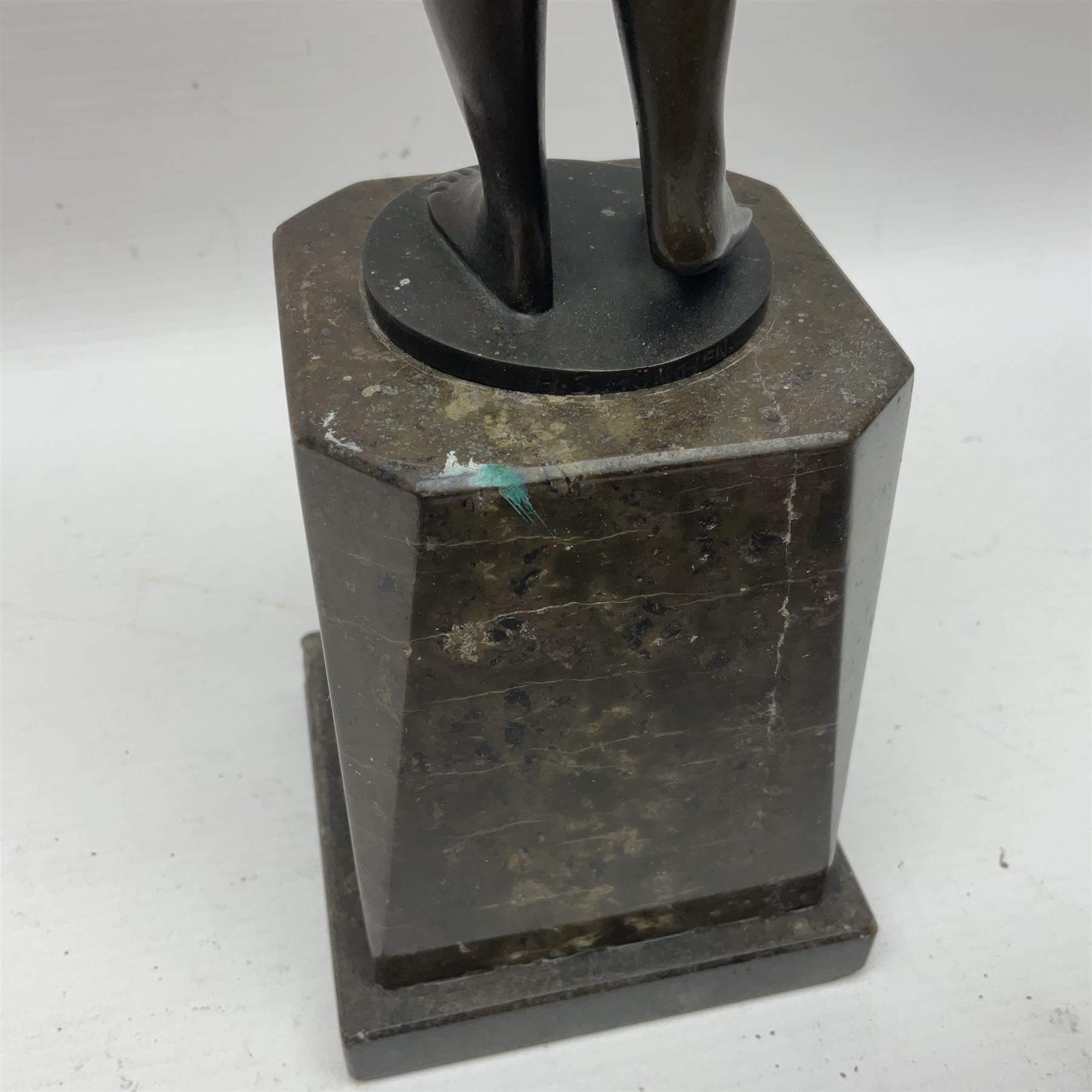 Bronze nude female figure holding a rose, upon a stone plinth, H40cm 