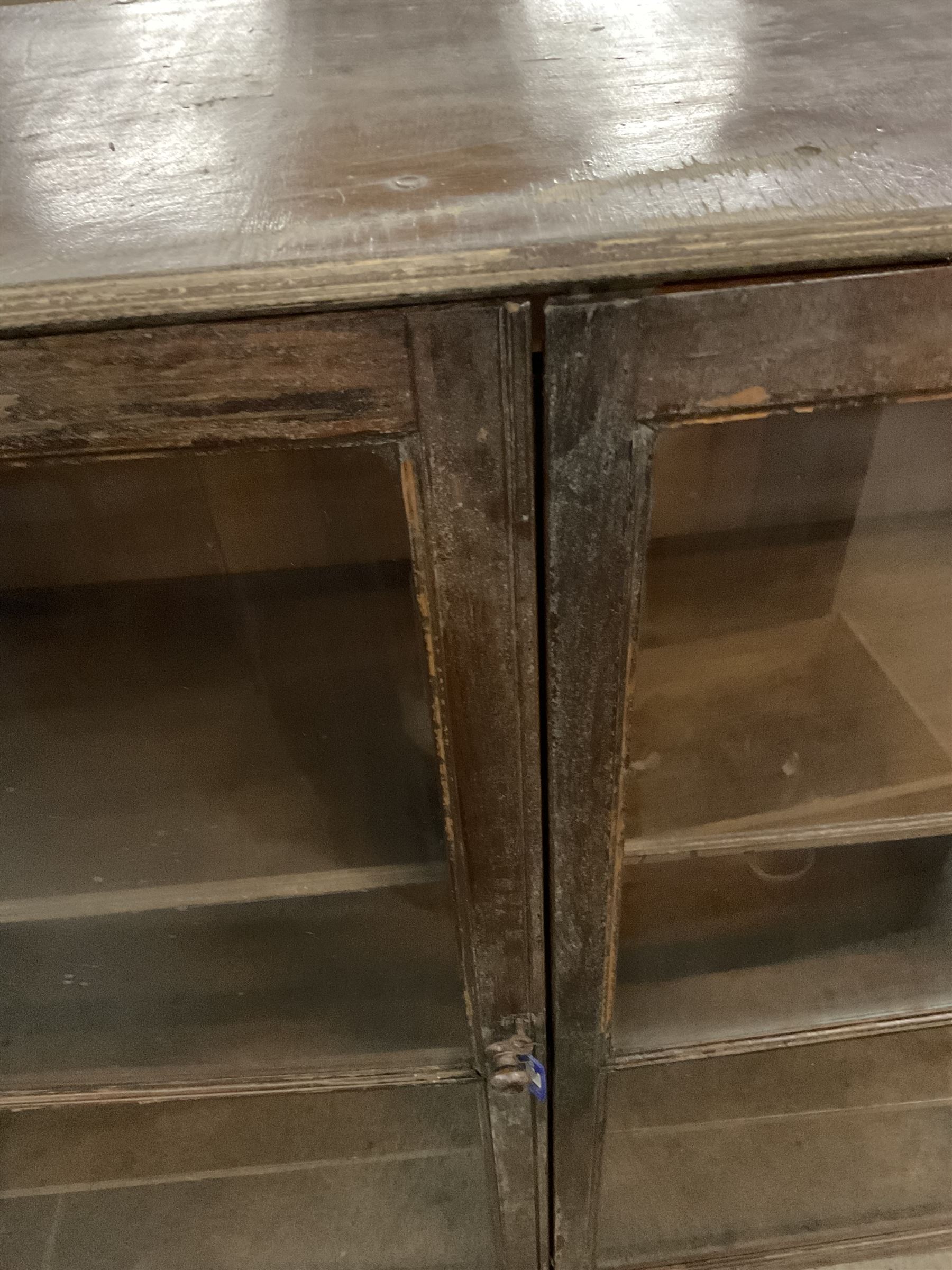 20th century painted pine standing bookcase, fitted with two glazed doors enclosing two adjustable shelves - THIS LOT IS TO BE COLLECTED BY APPOINTMENT FROM THE OLD BUFFER DEPOT, MELBOURNE PLACE, SOWERBY, THIRSK, YO7 1QY