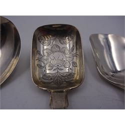 Three silver caddy spoons, comprising George III Fiddle pattern example, William IV Fiddle pattern example with later engraved bowl. and shovel example with twist handle, hallmarked some elements indistinct