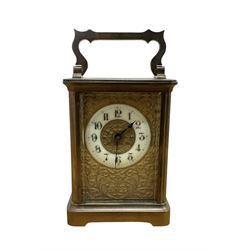 French - early 20th century brass cased carriage clock in a cornich case with an etched di...