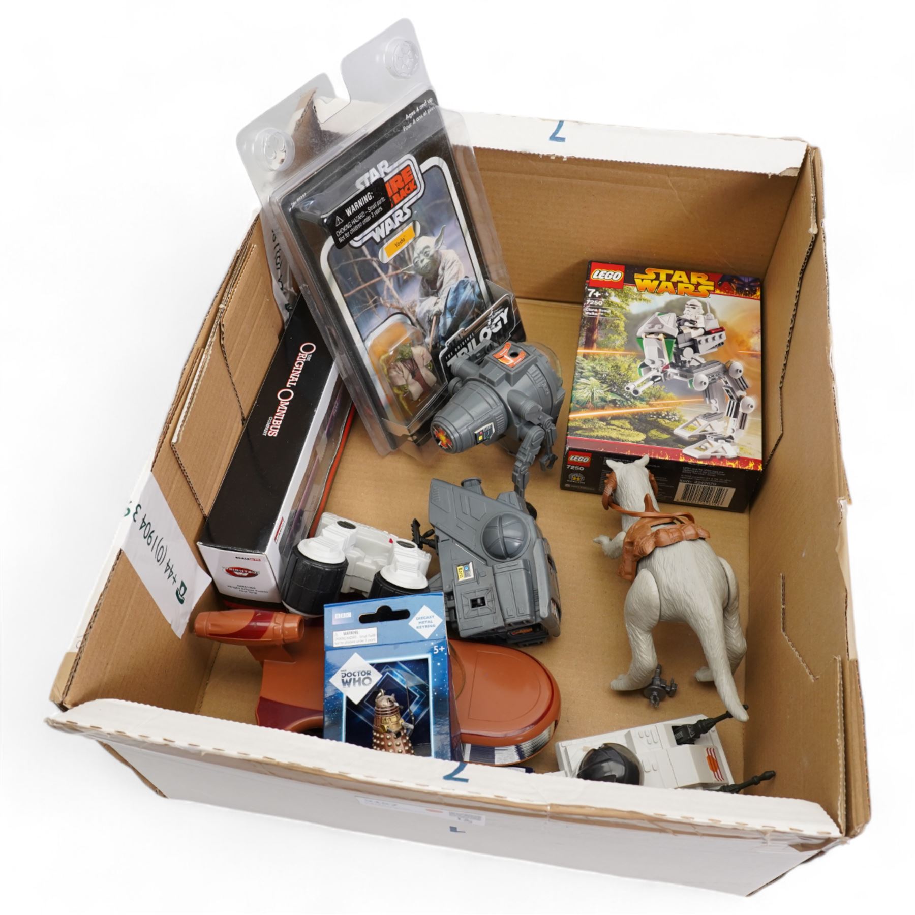 Star Wars Hasbro 'The Original Trilogy Collection' boxed Yoda action figure, Star Wars Incredible Cross-Sections book, 7250 Clone Scout Walker Lego set (unchecked for completeness), five loose vehicles and Tauntaun figure, two Doctor Who keyrings etc in one box