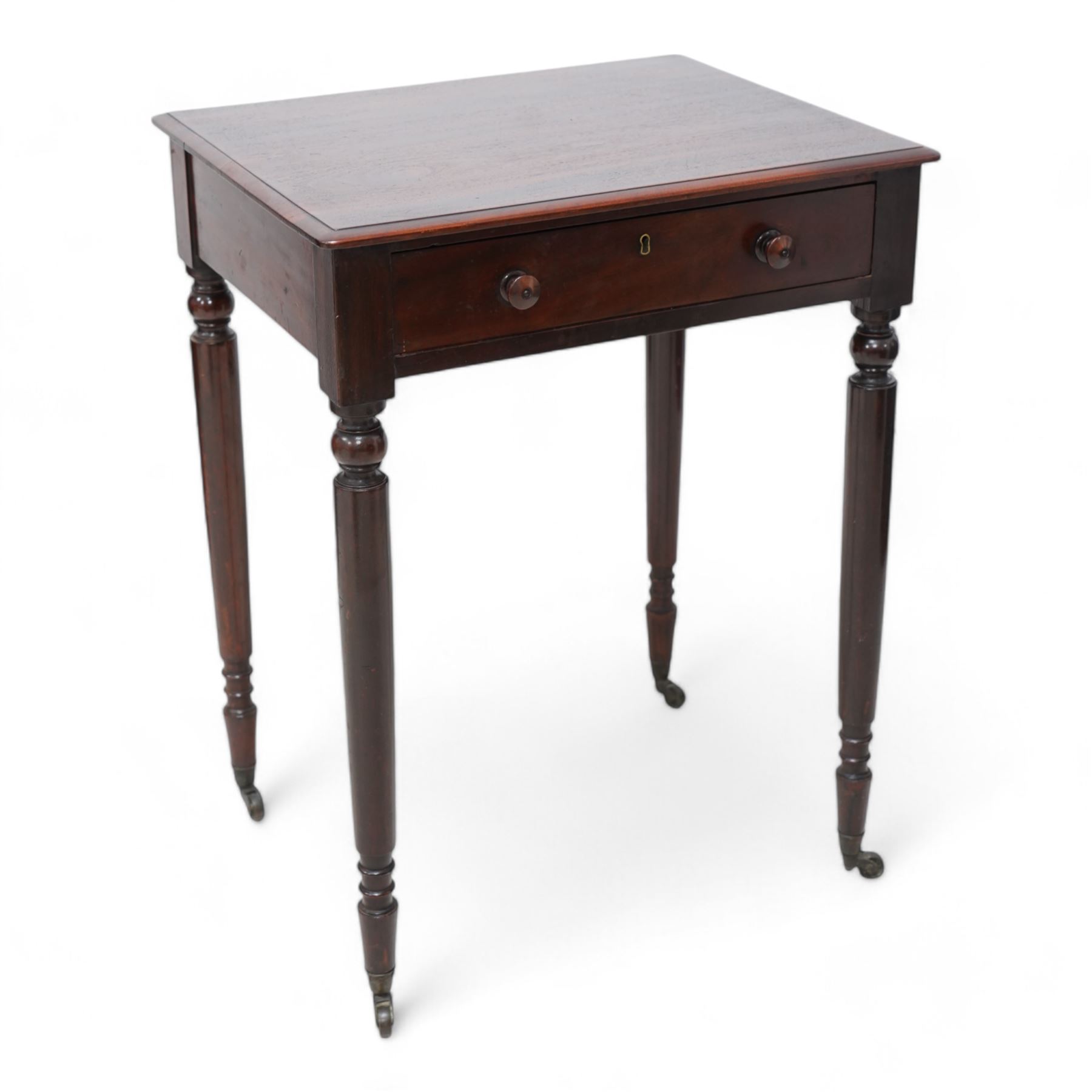 Small 19th century mahogany side table, rectangular top fitted with single drawer, raised on turned supports terminating to castors