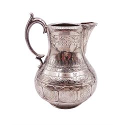 Arts and Crafts silver jug, of bellied form with C handle, the body engraved with a band of floral panels, with engraved scrolling and foliate decoration throughout, hallmarked hallmarked Samuel Smily, Goldsmiths Alliance, London 1873, H13cm