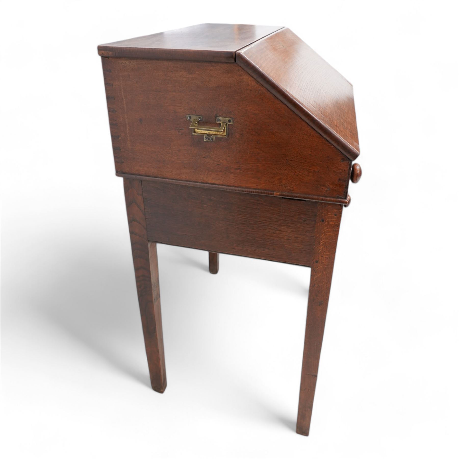 18th century oak campaign bureau, the removable top section enclosed by sloped lid, with fitted interior and carrying handles, on stand fitted with single drawer on square tapering supports