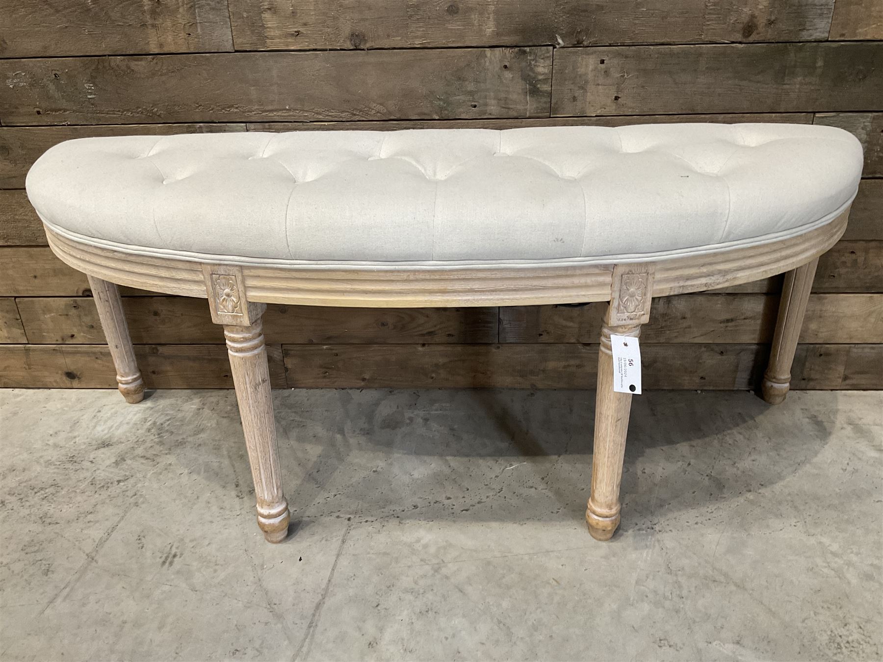 Washed oak demi-lune window seat, upholstered in buttoned linen fabric