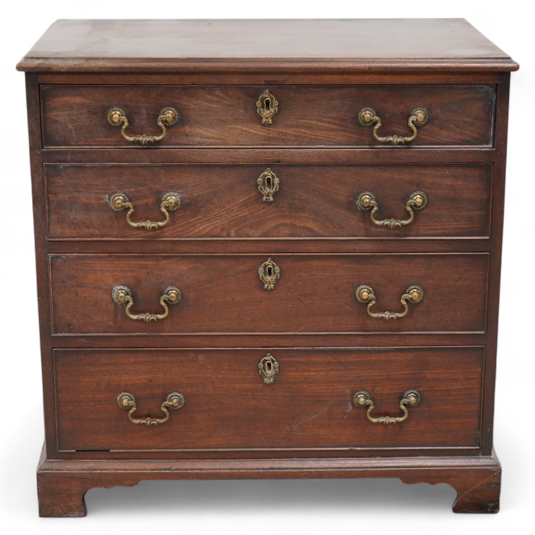 George III mahogany chest, moulded rectangular top over four graduating cock-beaded drawers, shaped and beaded handle plates with ornately cast swan neck handles, on bracket feet