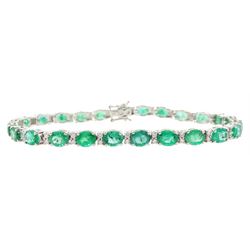 18ct white gold oval cut emerald and round brilliant cut diamond bracelet, stamped, total emerald weight approx 8.15 carat