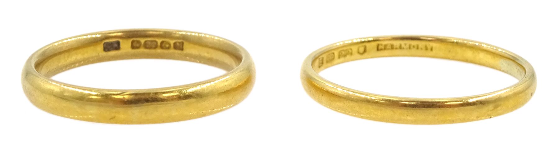 Two gold wedding bands, both hallmarked 22ct