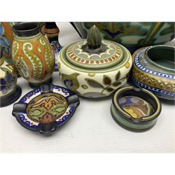 Dutch Gouda Wares, including twin handled jardiner, pair of candle sticks, tray, ashtrays etc 