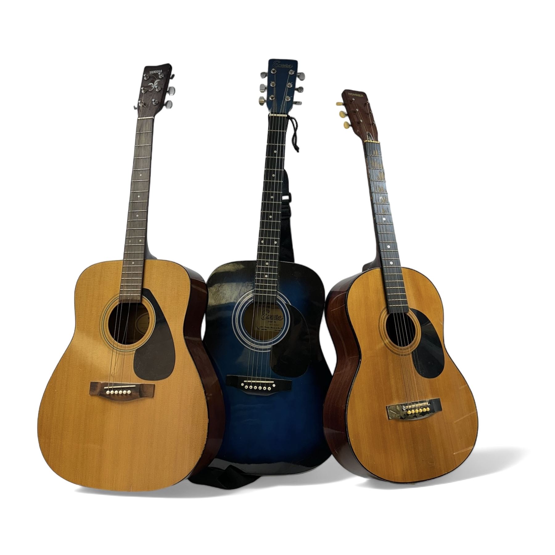 Three acoustic guitars, comprising Yamaha FX-310, Hohner MW-300 and Encore EN155BLMOFT