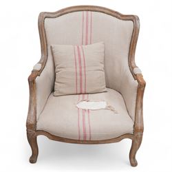 Pair of large hardwood-framed French design armchairs, moulded and shaped frames terminating to cabriole feet, upholstered in pale fabric with pink stripes 