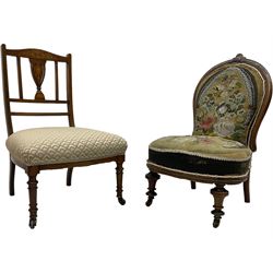 Early 20th century mahogany side chair, detailed marquetry frame, backrest with central urn motif and scrollwork inlay, arched crest rail with floral designs, cream and gold patterned fabric seat, turned front legs with brass castors (H78cm); Victorian walnut nursing chair, carved crest rail, floral needlepoint tapestry upholstery, turned front legs with ceramic castors (H81cm)