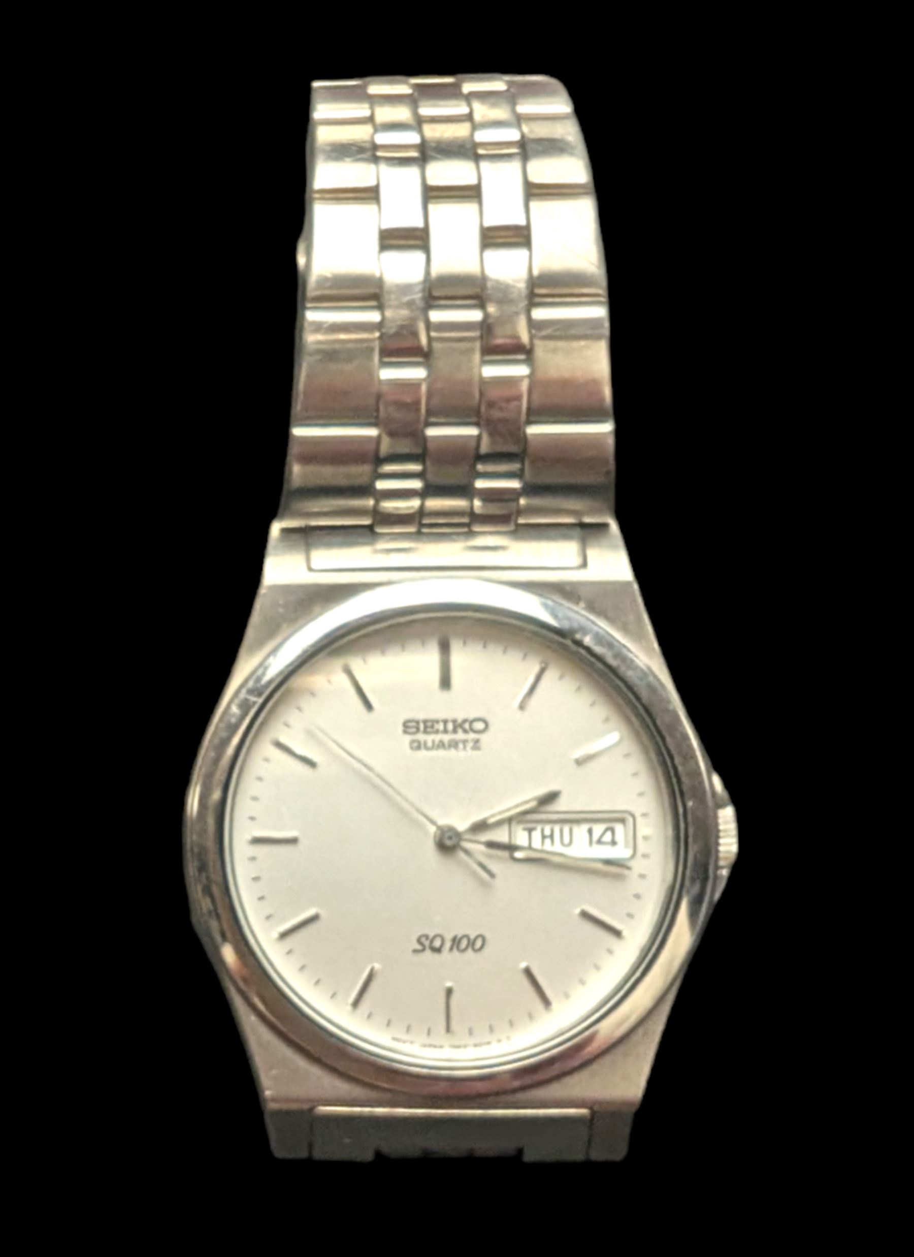 Seiko SQ100 stainless steel gentleman's wristwatch