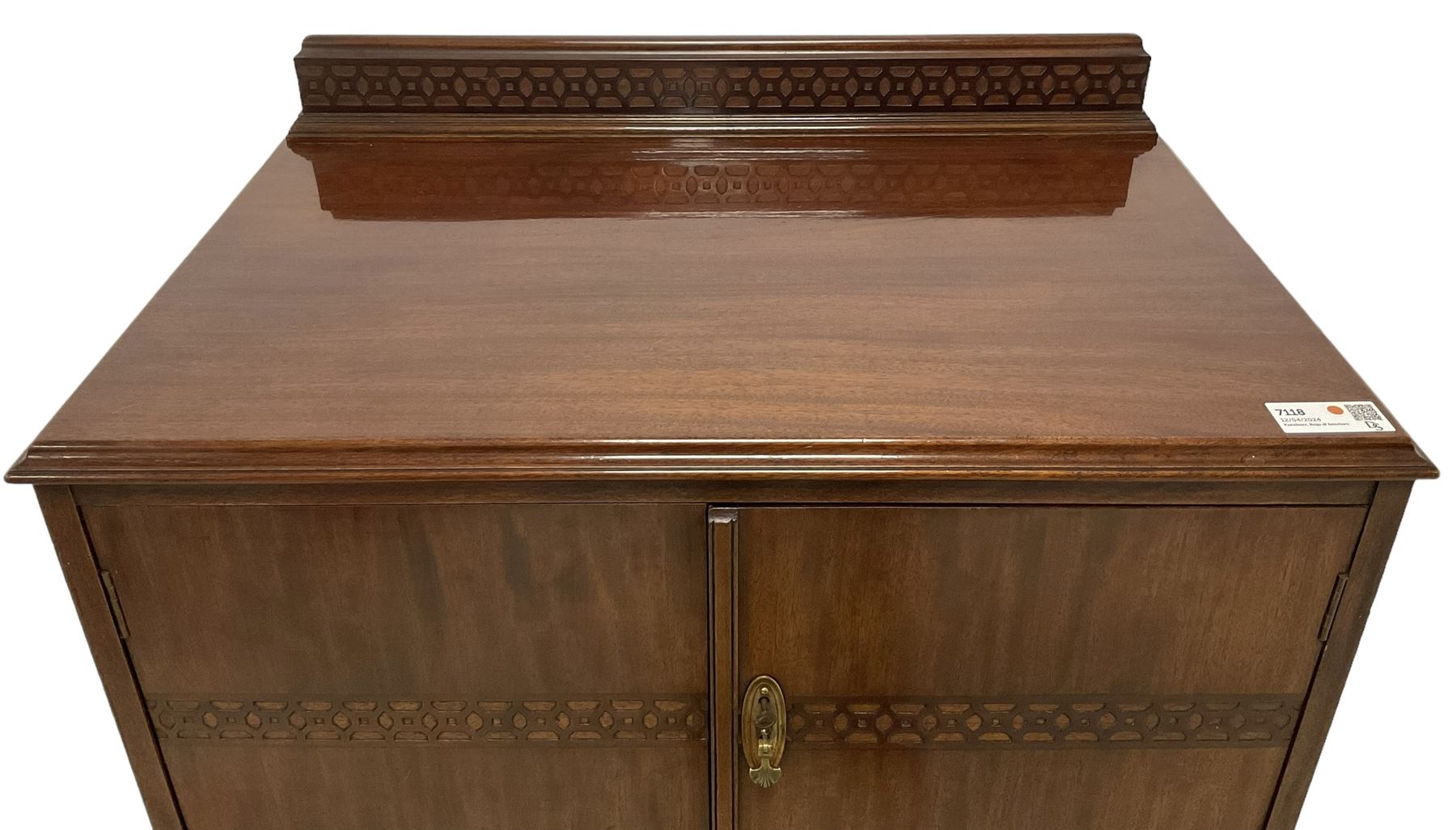 Early 20th century mahogany tallboy, double cupboard over three drawers, on ball and claw carved cabriole feet