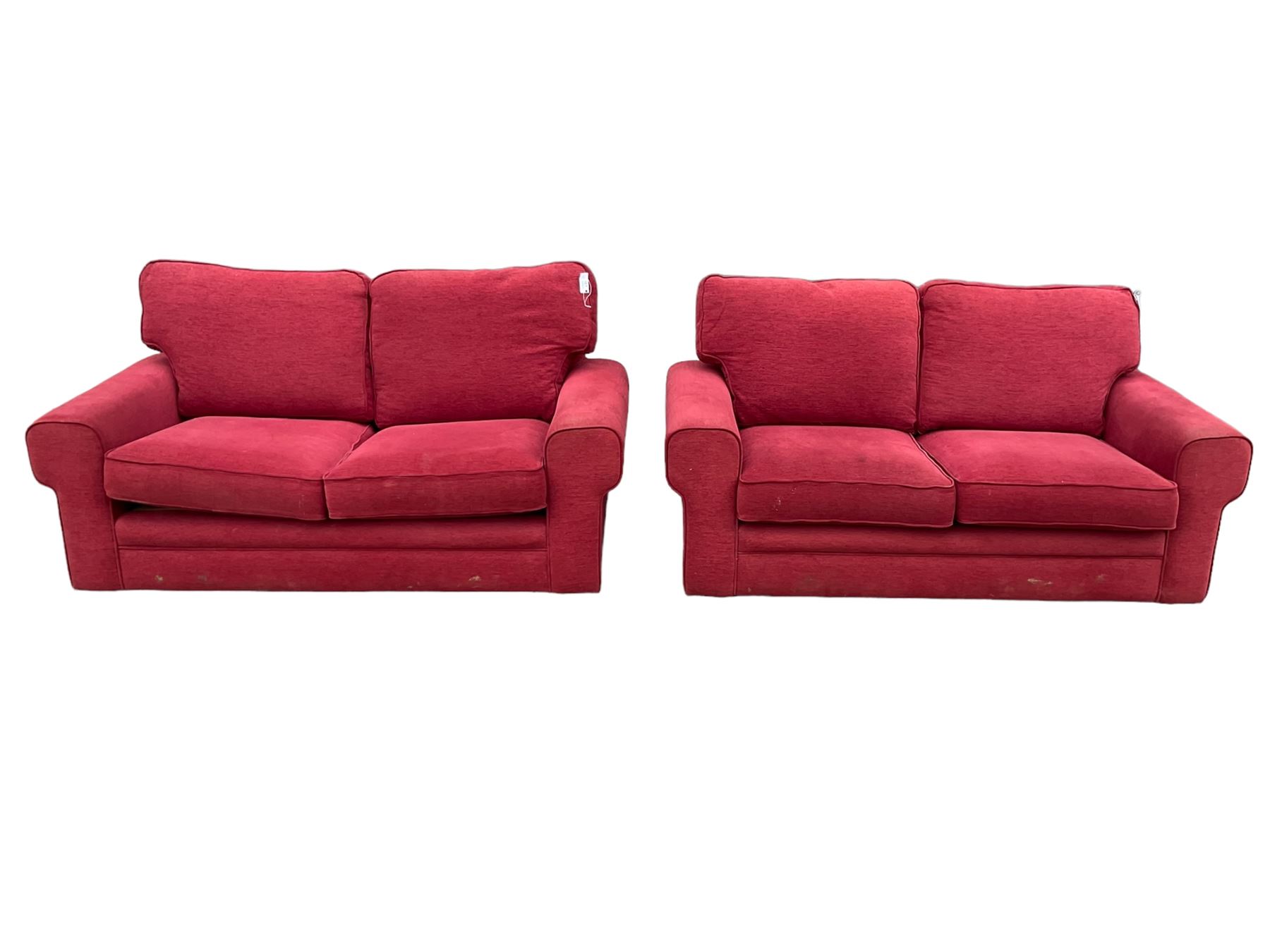 Pair of two seat sofas, upholstered in red fabric