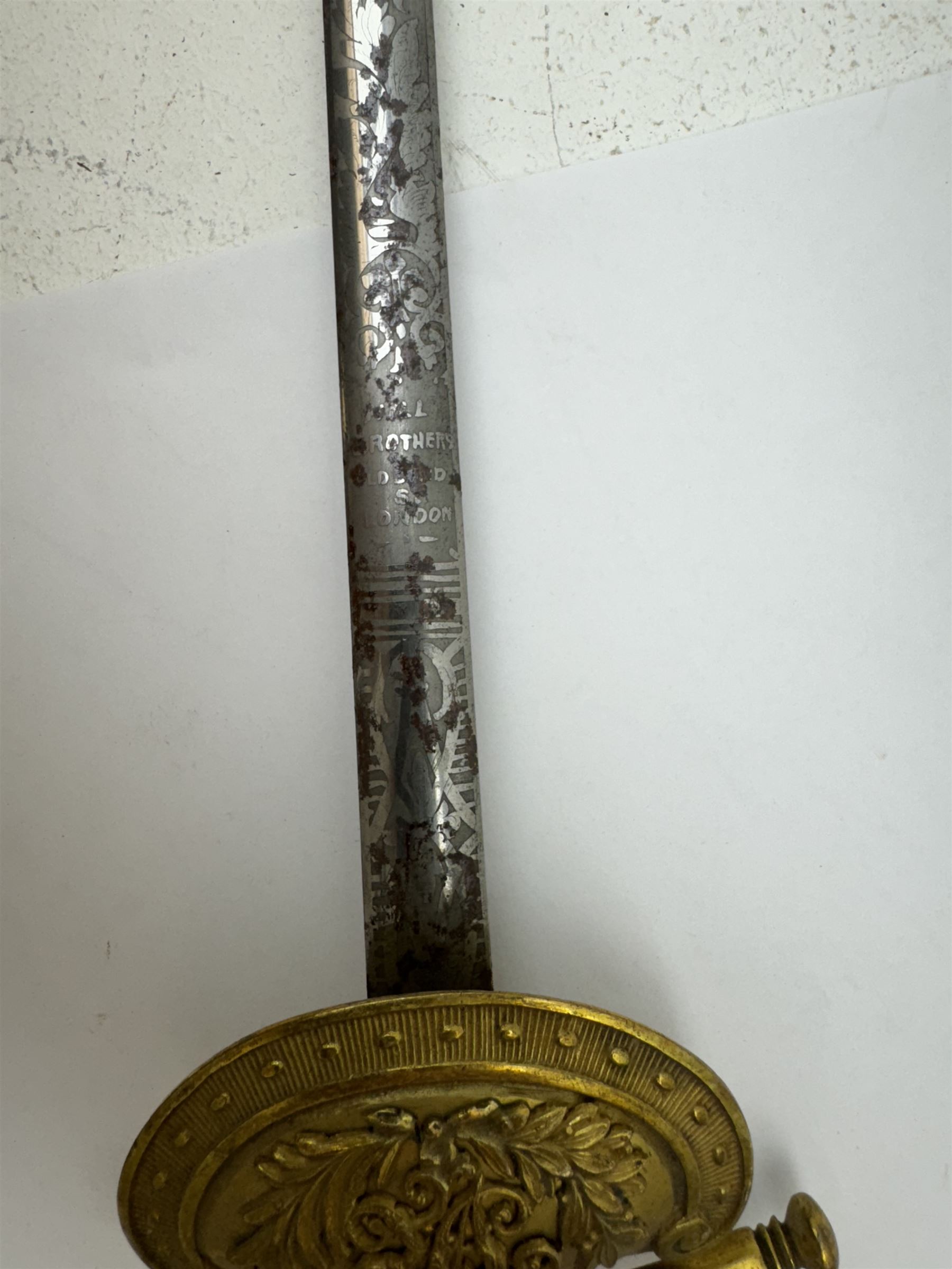 British Victorian court sword, the L79cm straight narrow blade with etched decoration and marked Hill Brothers -3- Old Bond St London, in steel scabbard, L100cm 