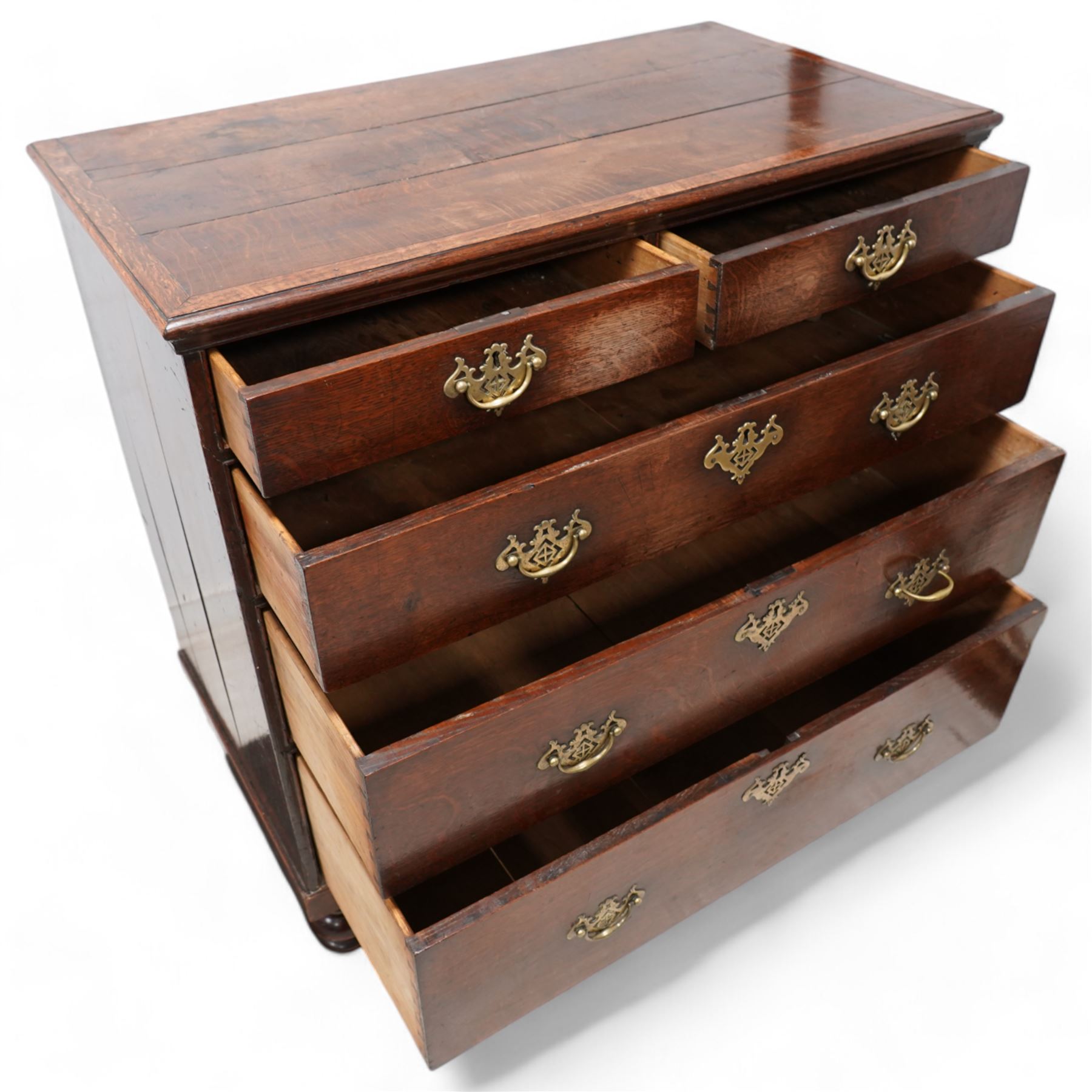 George III oak chest, rectangular crossbanded top, fitted with two short over three long graduating drawers, on turned feet