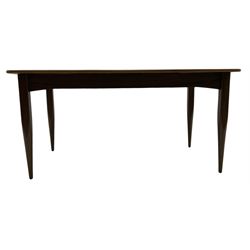 Mid-20th century figured walnut extending dining table, pull-out action with fold-out leaf, on tapering supports 