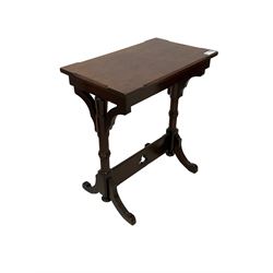 Late Victorian walnut ecclesiastical side table, rectangular top with stop chamfered edge, on turned supports united by rectangular stretcher pierced with trefoil, on splayed feet 