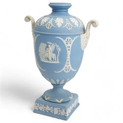 Group of five late 19th and early 20th century Wedgwood blue jasperware urn vases, H28cm and smaller (5)