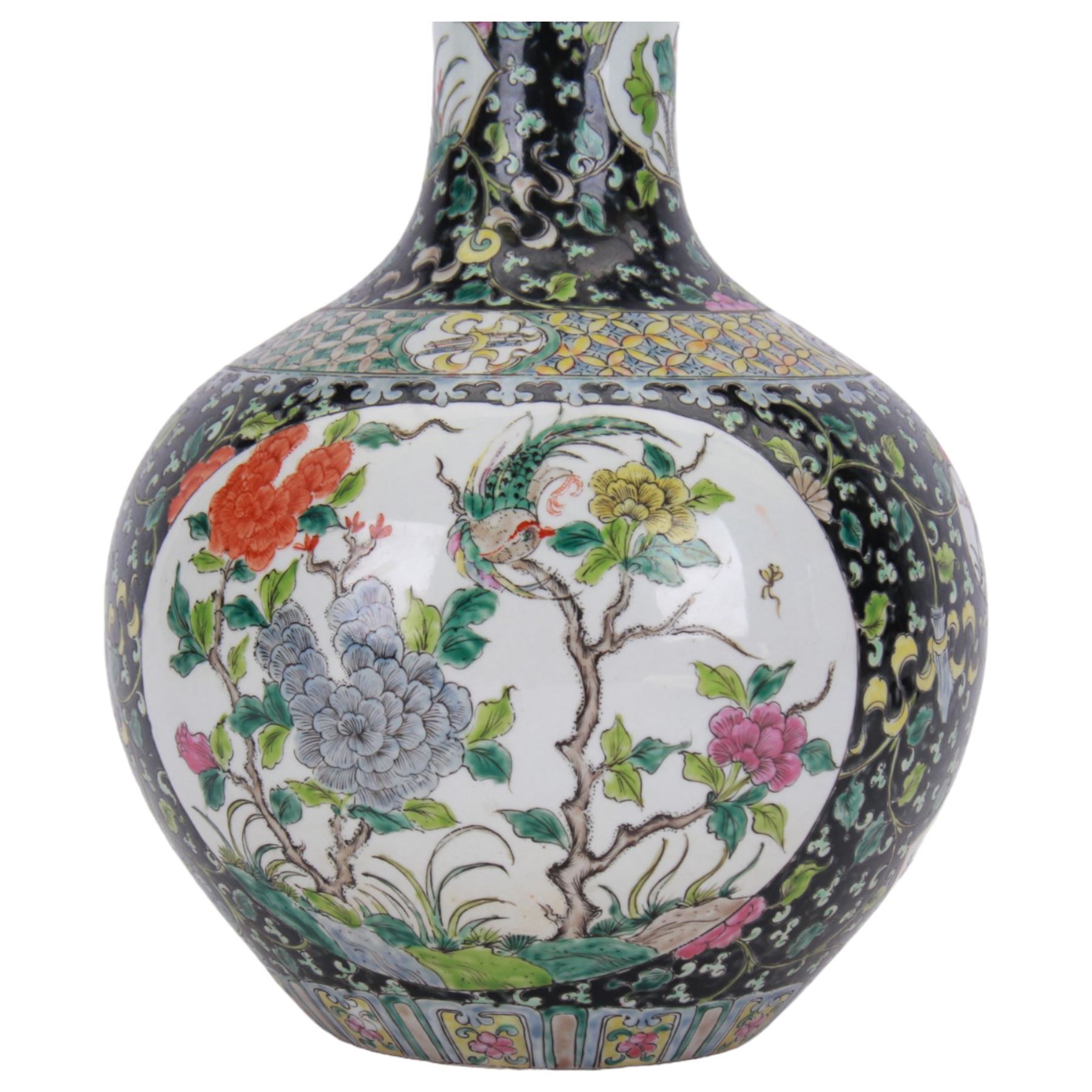 19th century Chinese famille noire bottle vase, decorated with two large reserves painted with ho ho birds amidst blossoming peonies, and six smaller reserves of flowers, against a black ground profusely decorated with leafy tendrils, with character mark beneath, H36cm