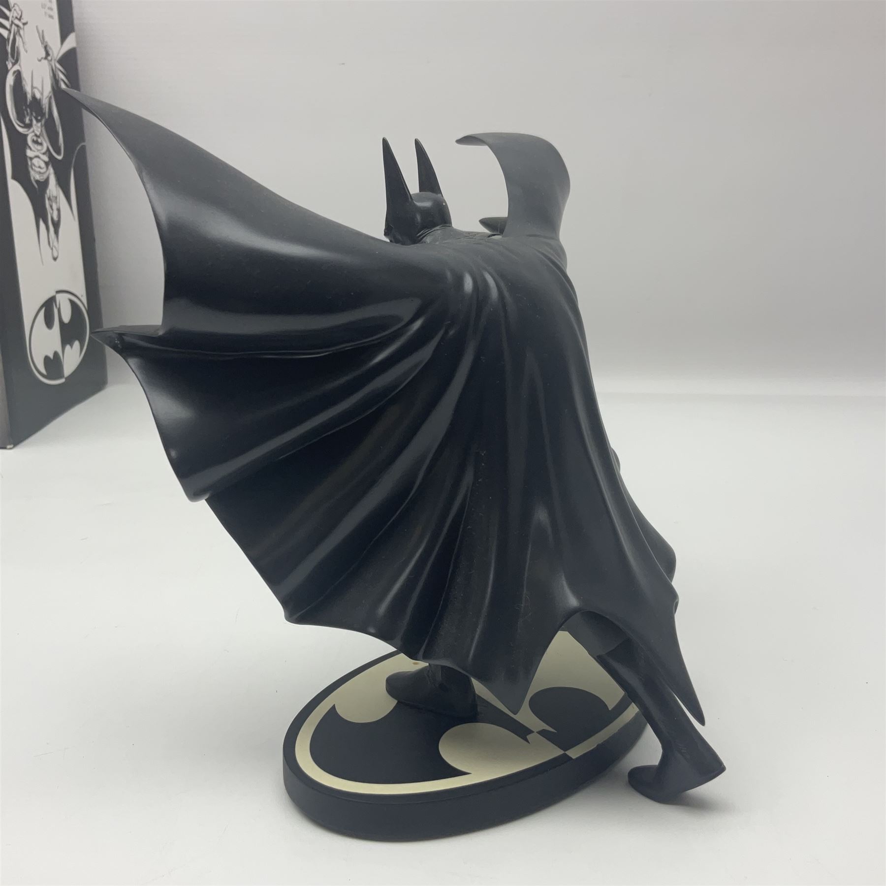 Group of five limited edition DC Direct Black and White Batman hand-painted cold-cast porcelain statues in original boxes, with two similar examples from DC Collectibles 