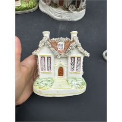 Group of five 19th century Staffordshire pastille burners, modelled as various buildings, largest example H17cm