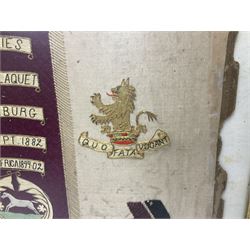 Commemorative Military needlework, headed 'VII Princess Royal's Dragoons Guard, the central flag has the regimental title, surrounded by a Union wreath of roses, thistles and shamrocks, topped with a crown, the Hanoverian white horse features in two corners, framed H58cm, L73cm