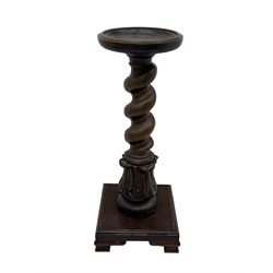 Late 19th century mahogany plant stand or torchère, circular top over barley twist column and carved acanthus base, on square plinth with bracket supports