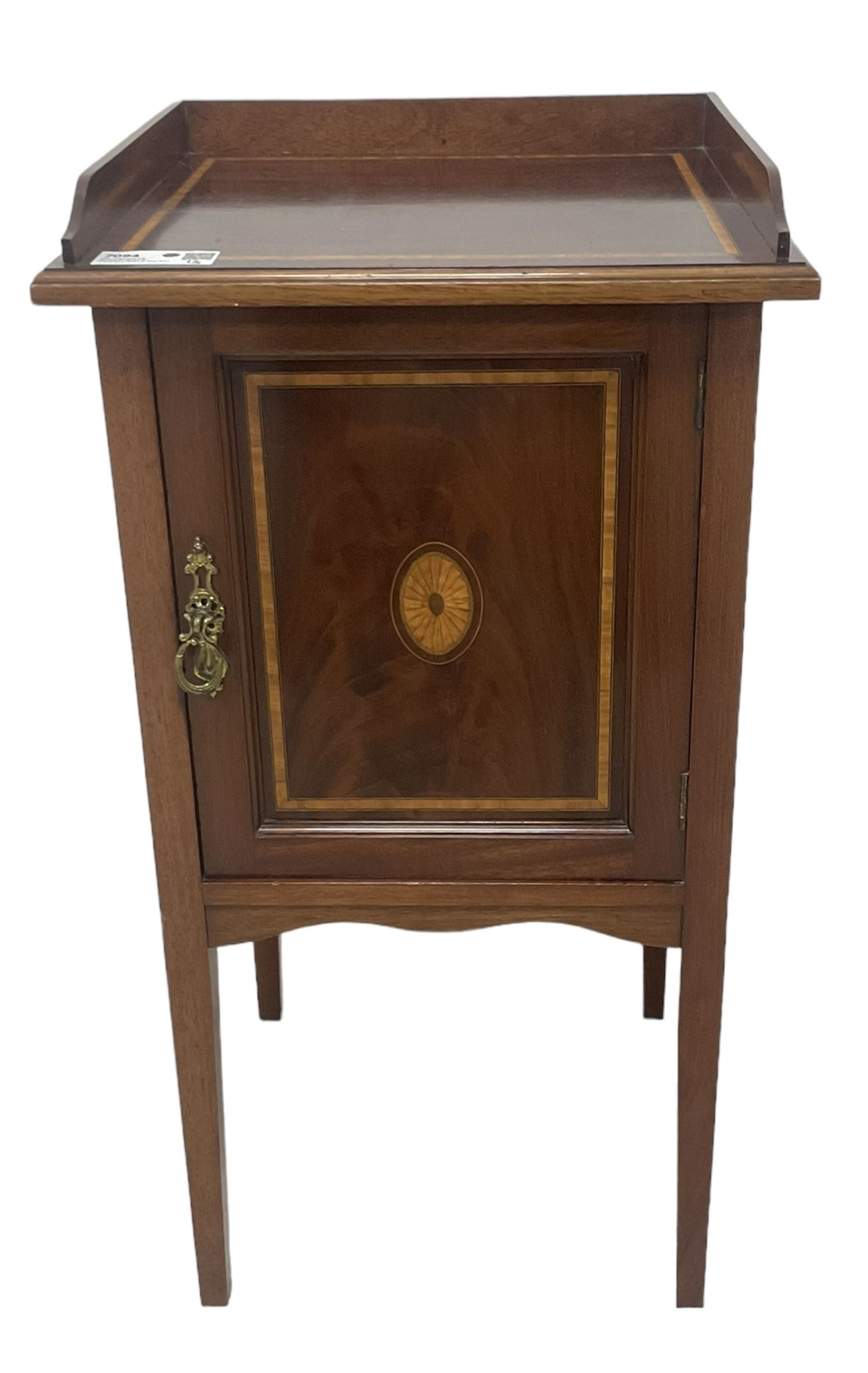 Edwardian inlaid mahogany pot cupboard, raised three-quarter gallery back, panelled door with fan inlay enclosing single shelf