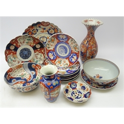  Collection of Japanese Imari plates, various sizes, matching bowls and vases and 19th century Chinese bowl decorated in the Imari style, D20cm  