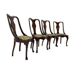 Set of eight late 19th century mahogany spoon back dining chairs, each with shaped top rail over Queen Anne design vase-shaped splat, upholstered seats in floral patterned fabric, raised on cabriole supports with scroll carved knees