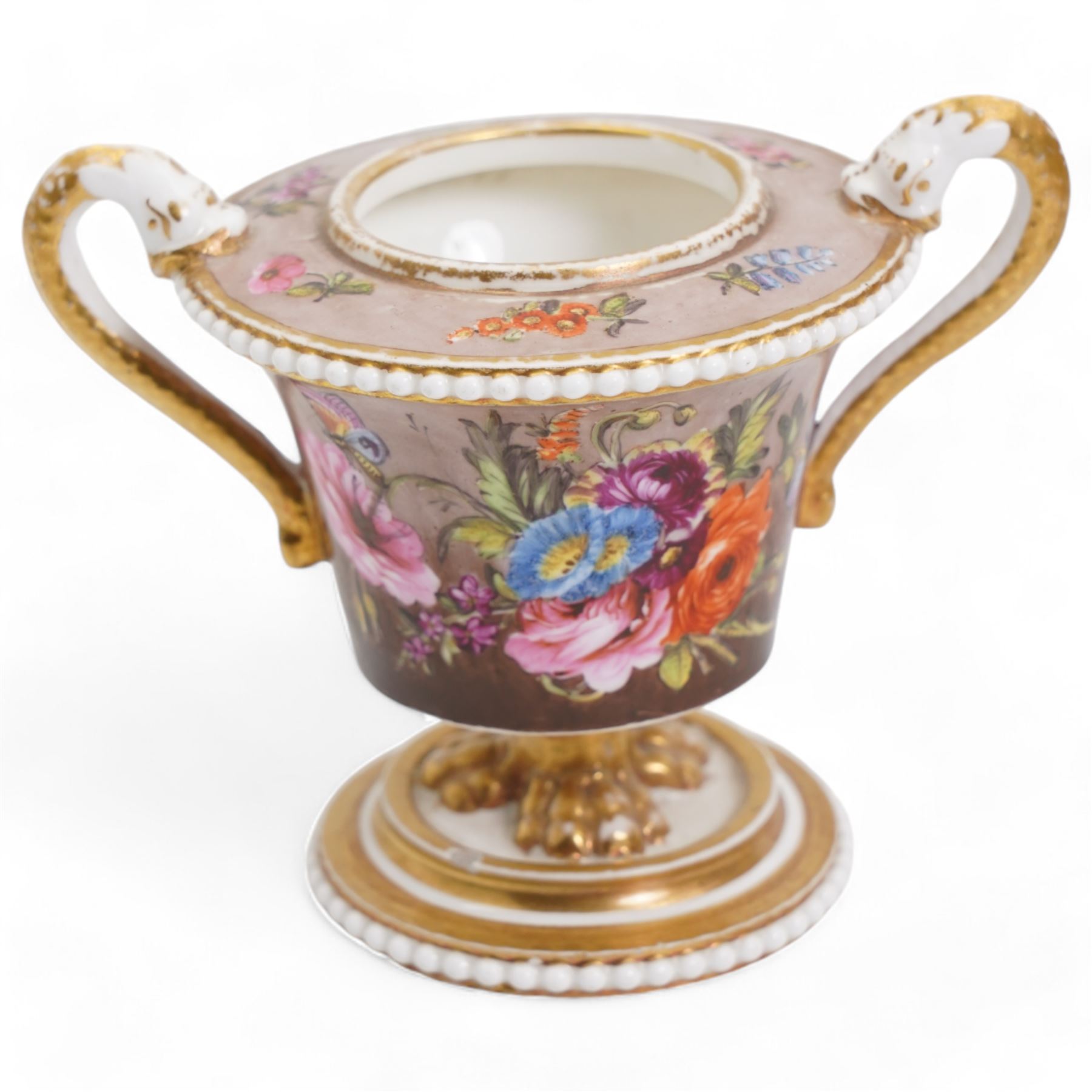 Early 19th century Spode pastille burner, of twin handled urn form, the body hand painted with a basket of flowers and further flowers and butterfly verso, within beaded border and lion paw stem, lacking cover, H8cm, 18th/19th century porcelain vase and cover, decorated with panels of flowers within orange and gilt bands, possibly Spode H16cm, together with an early 19th century Spode (1800-1820) pen tray, of oval form, decorated in raised gilt with two birds perched on a branch, within a fruiting vine border, pattern no. 093, L27cm