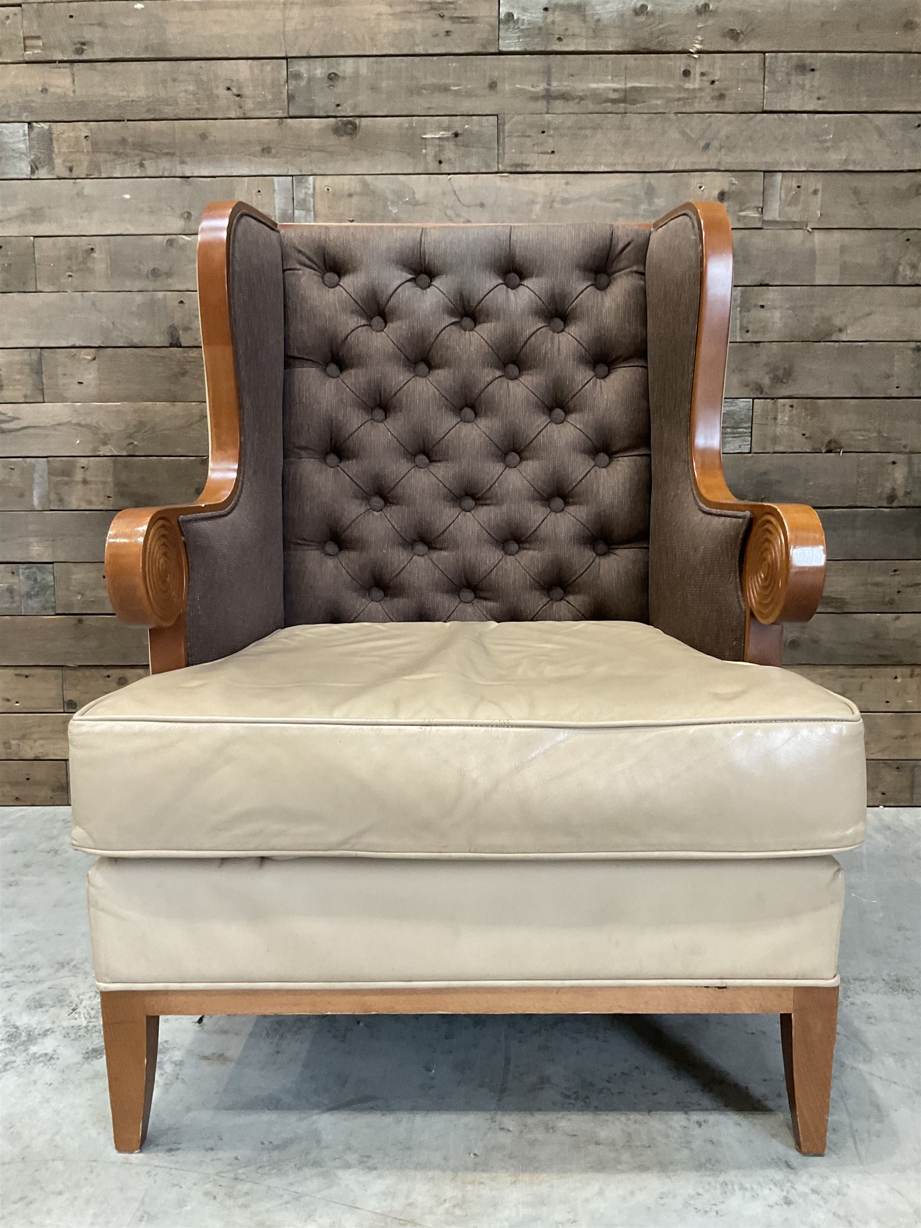 Walnut finish framed wing back armchair upholstered leather and buttoned fabric