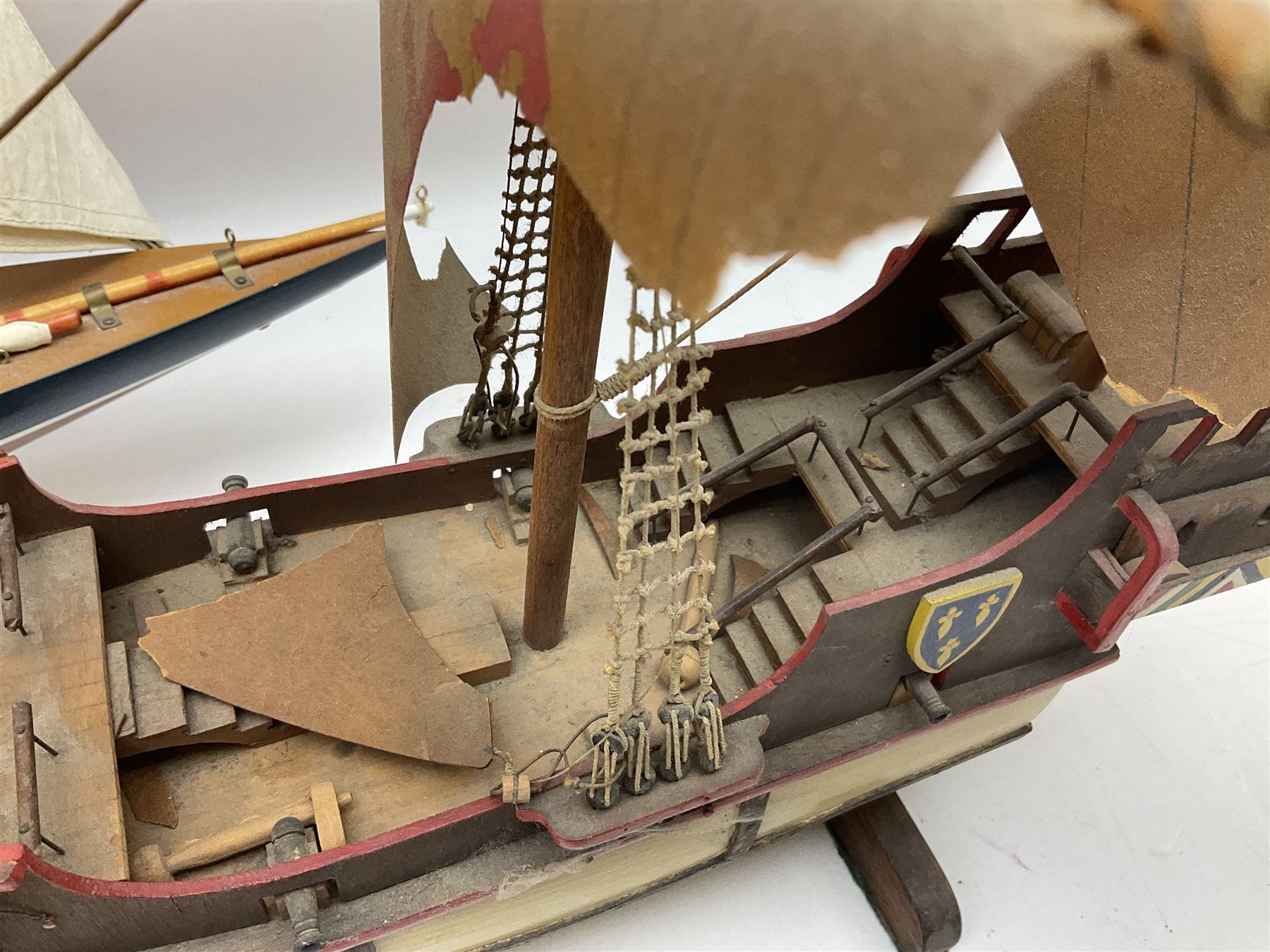 Wooden model of a schooner together with another similar example, largest example 48cm